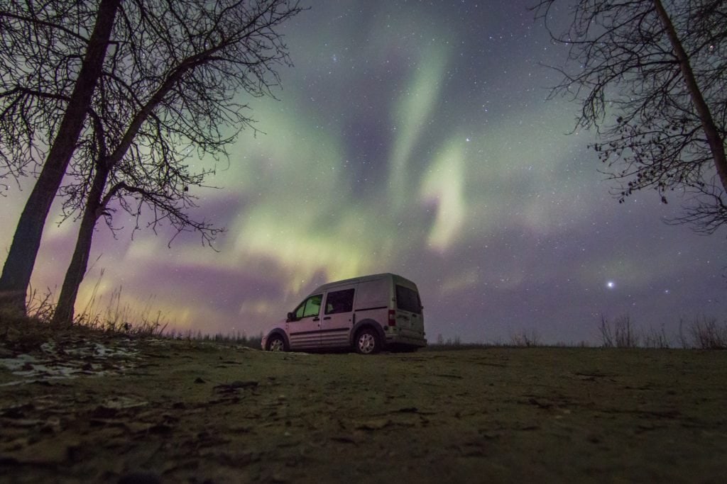 Van life is helping Sarah pay off her debt. Click here to learn more about living in a van and how she built her van dwelling. #vanlife #vandwelling #vanlifehacks #vanlifeDIY #vanlifeideas