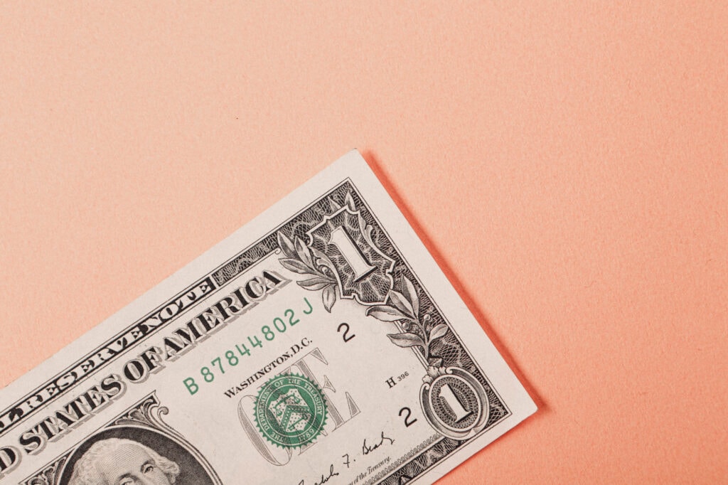 best jobs for 12 year olds to make money - picture of cash with orange background