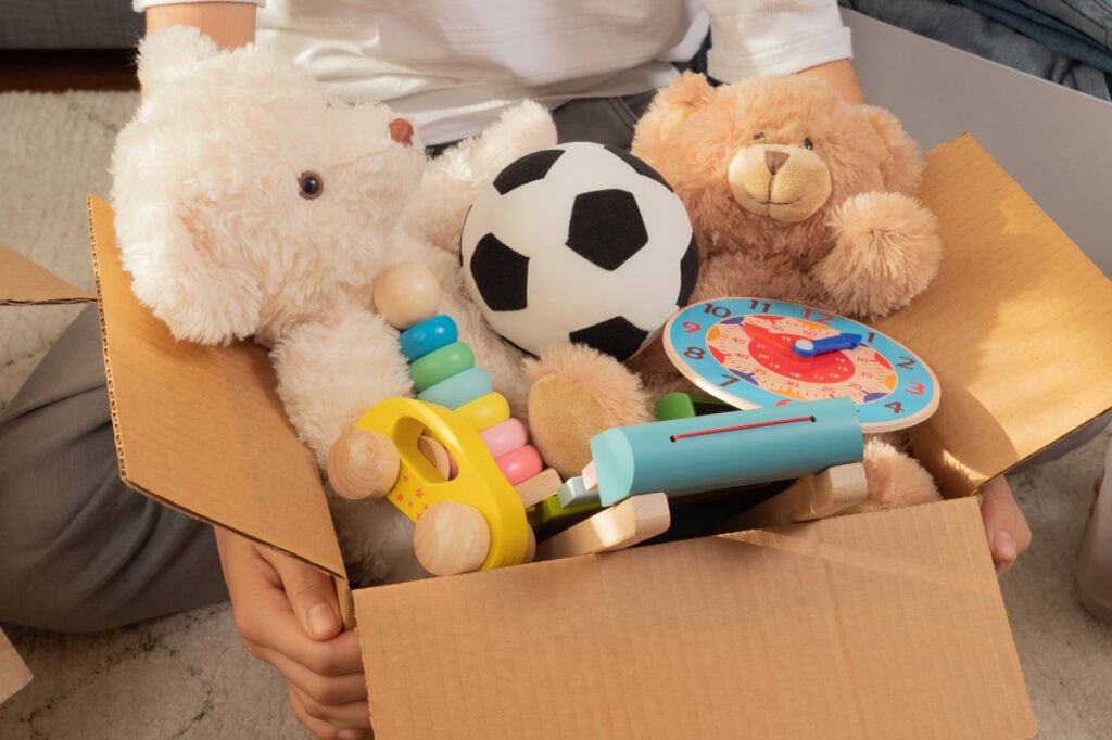 box of children's toys - best places to sell old toys - once upon a child